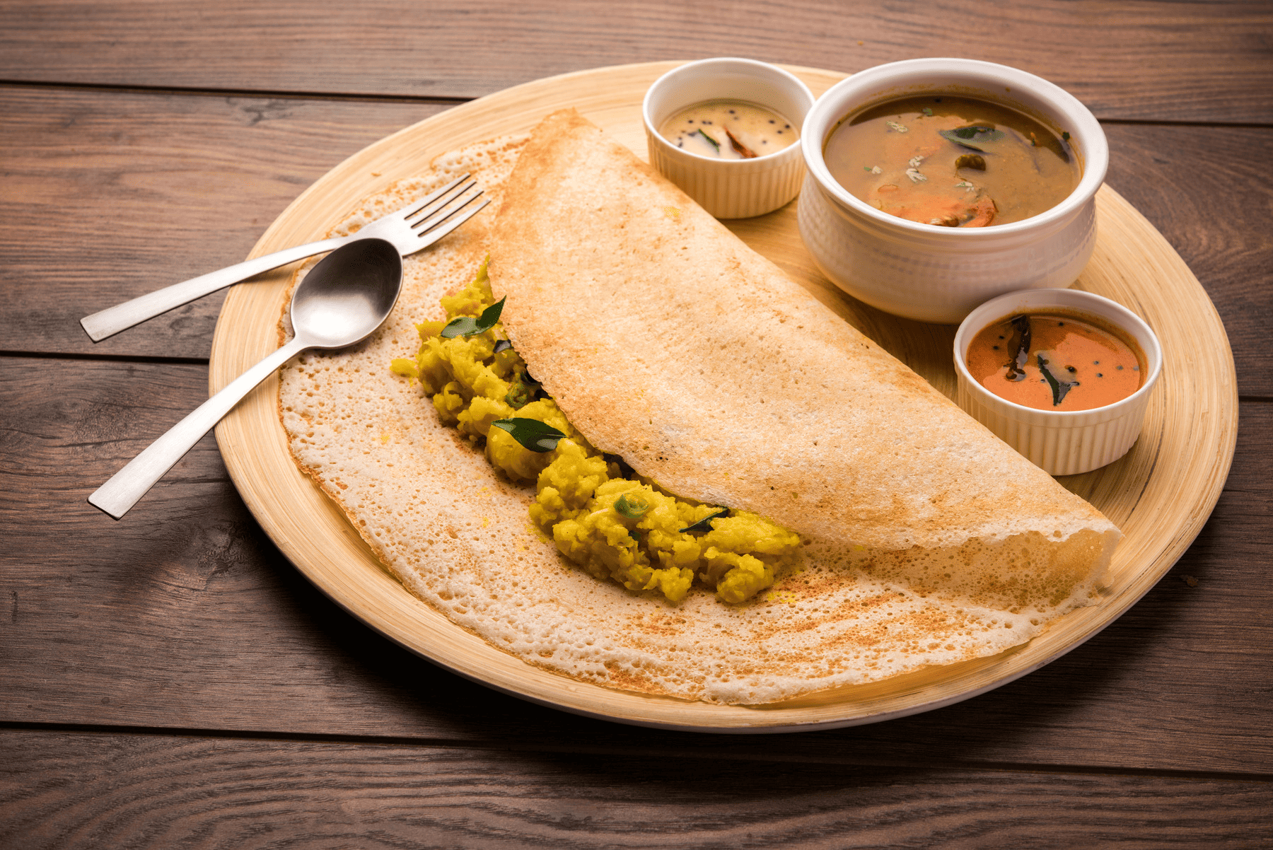Dosa, a South Indian delicacy served with chutney and sambhar